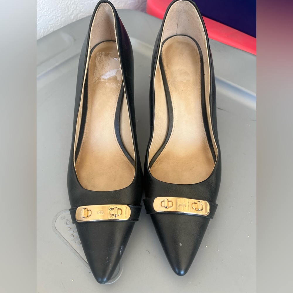 Coach Elegant Black Leather Pumps with Gold Accents
